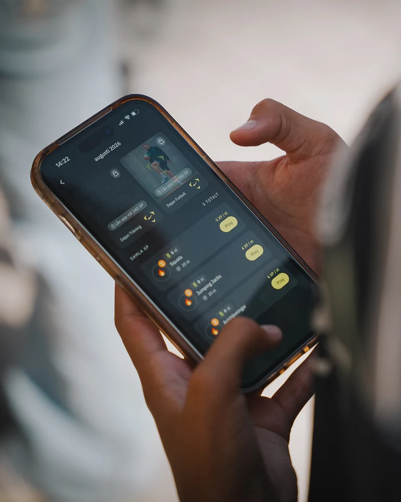 A person using the FUZED app to explore physical activity challenges and earn XP